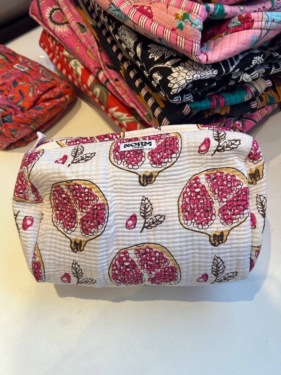 Cream pomegranate wash bag